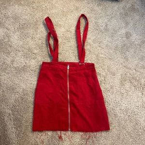 Like new (worn once) Red corduroy skirt jumper with silver details